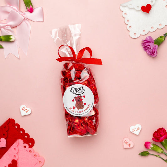 a bag of chocolates and flowers
