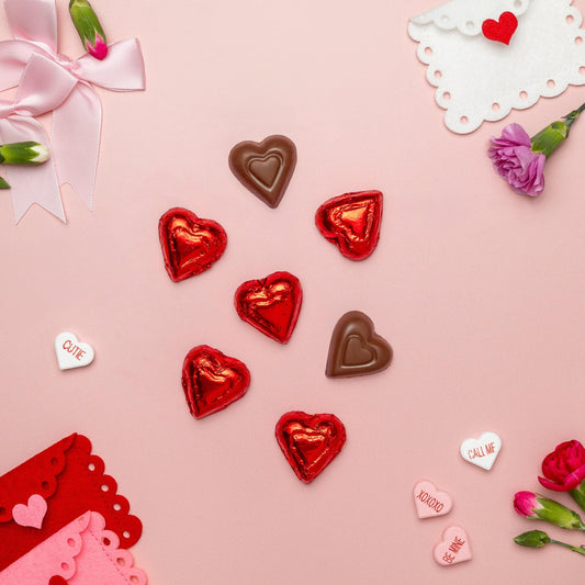 a group of chocolate hearts and flowers