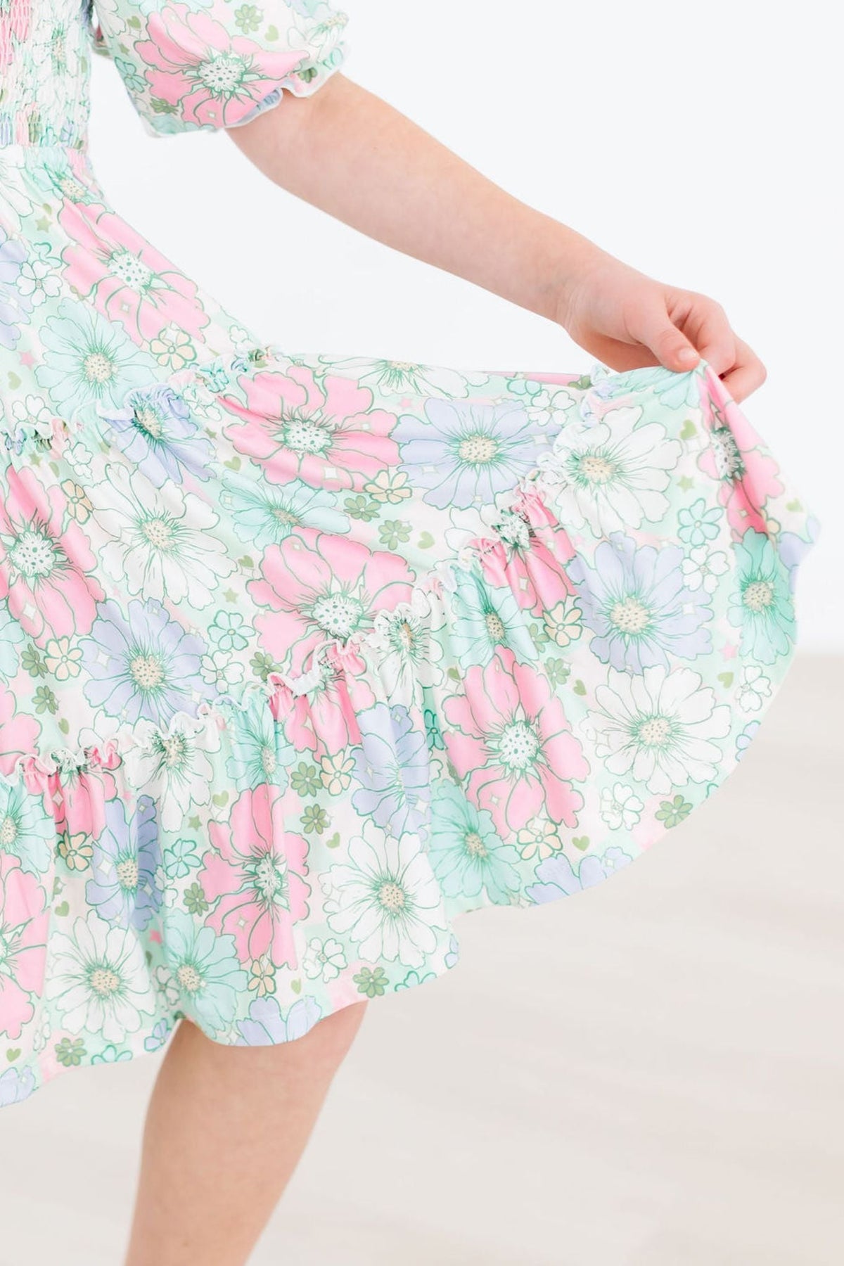 a person holding a dress