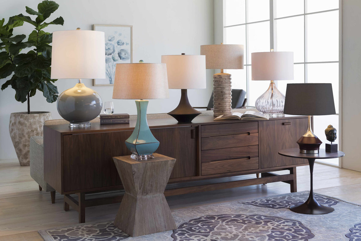 a group of lamps on a table