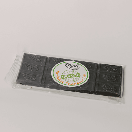 a black bar in a plastic wrapper