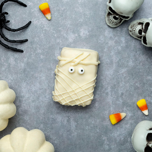 a candy and skulls on a surface