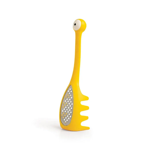 a yellow object with a hole in the middle