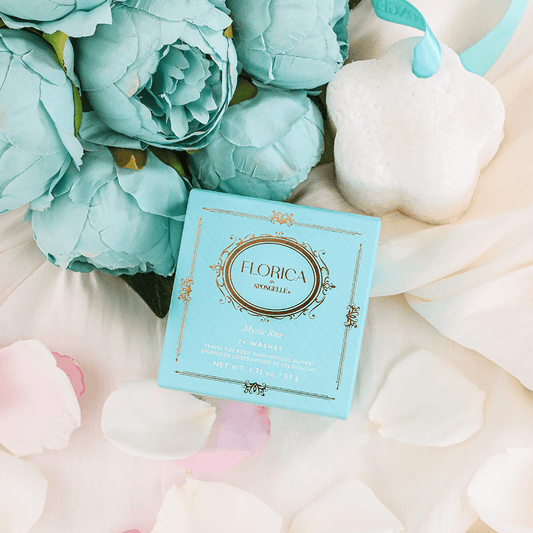 a blue box next to flowers