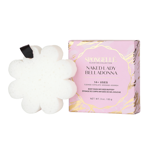 a white sponge next to a pink box
