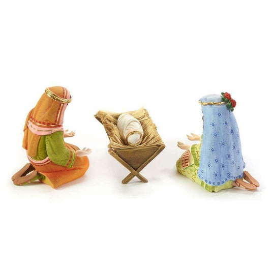a group of figurines of a manger