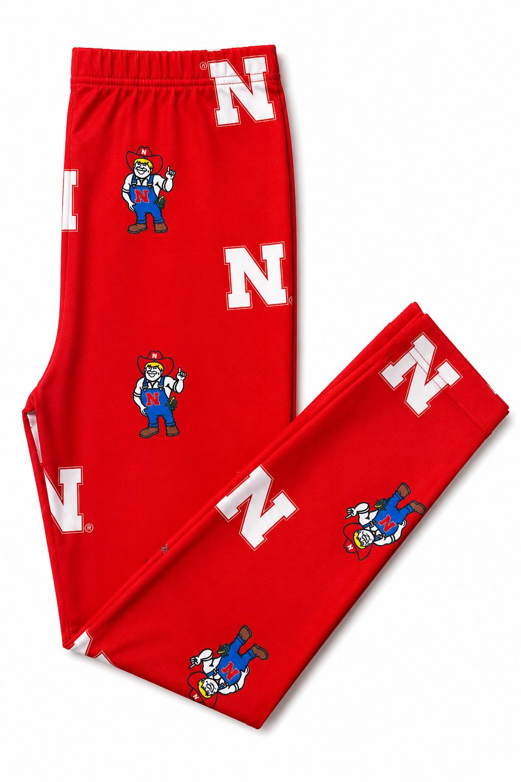 a pair of red pants with a cartoon character on them