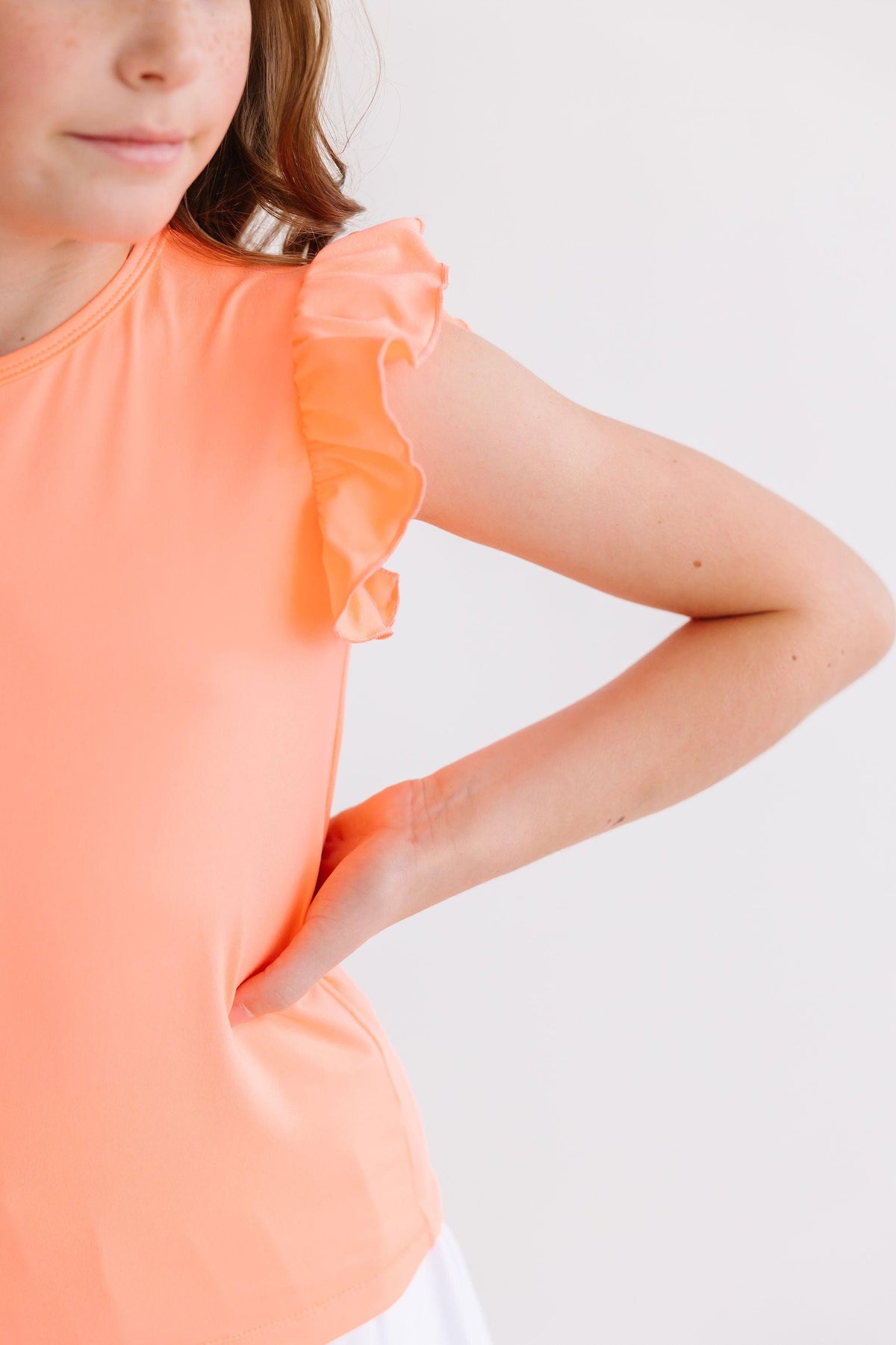 a woman in a pink dress