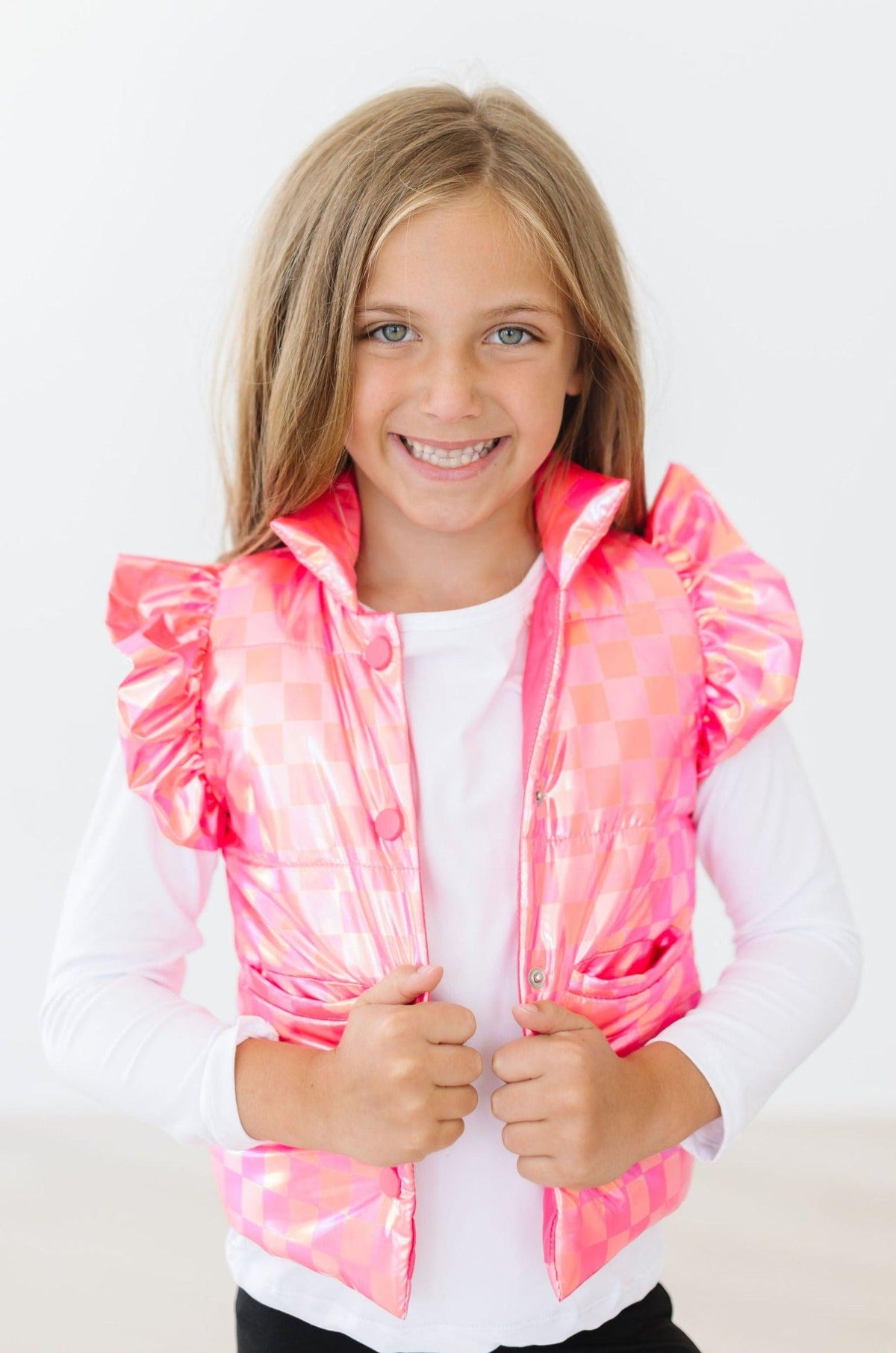 a girl smiling at the camera