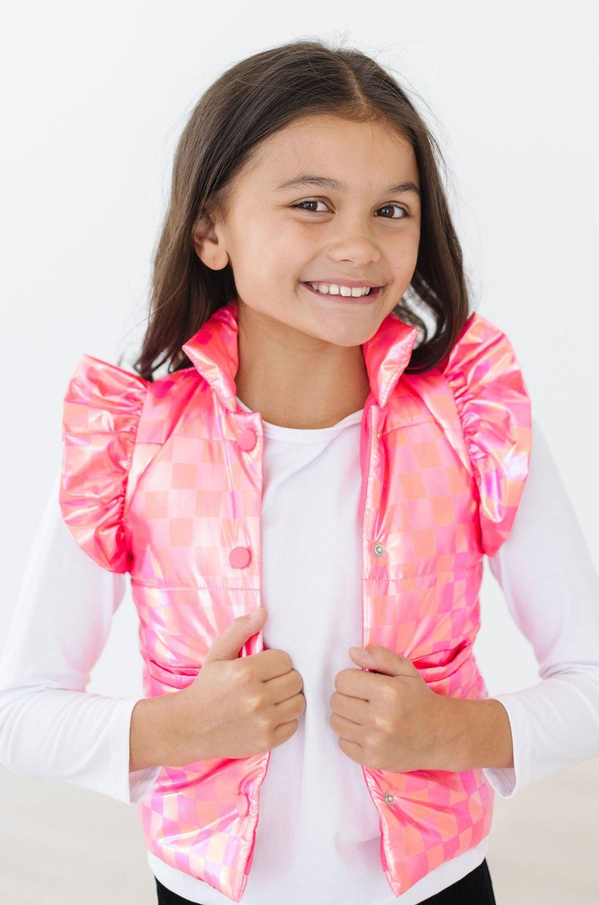 a girl smiling at the camera