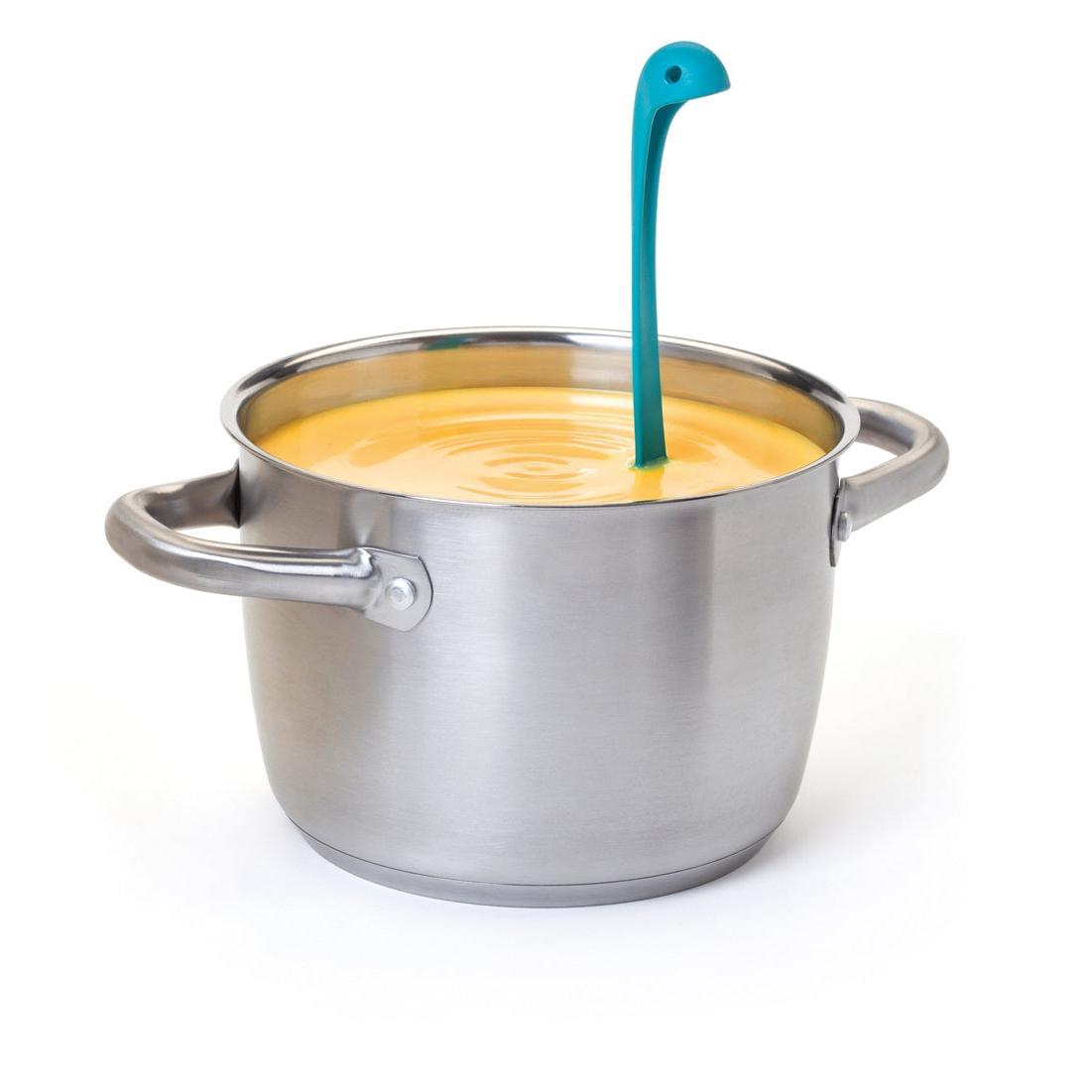a pot with a spoon in it