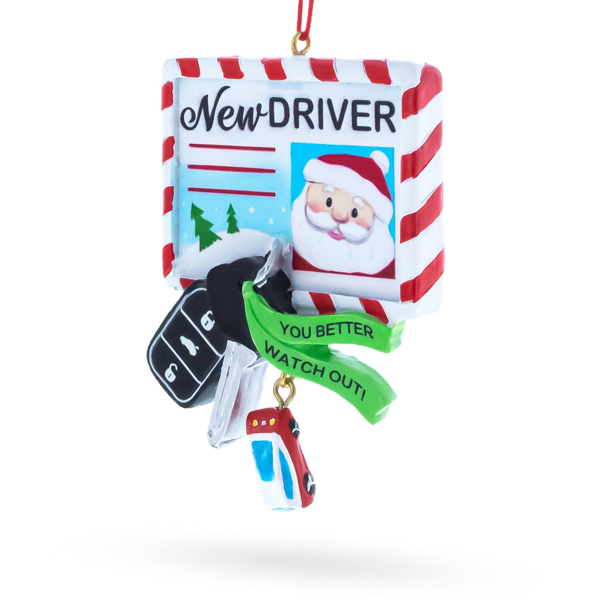 a christmas ornament with a santa claus and car keys