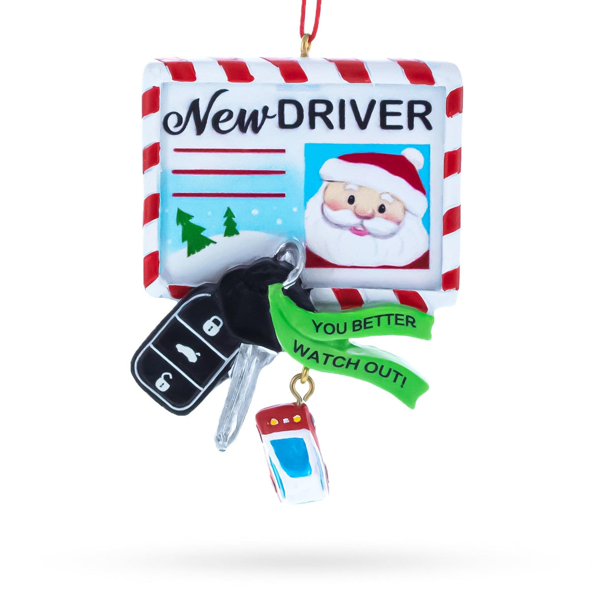 a christmas ornament with a car key and a santa claus