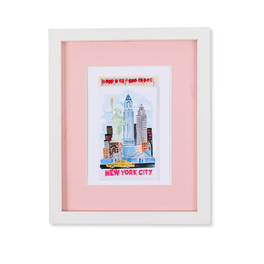 a framed picture of a city