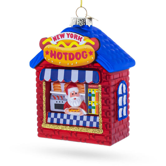a christmas ornament with a hot dog shop