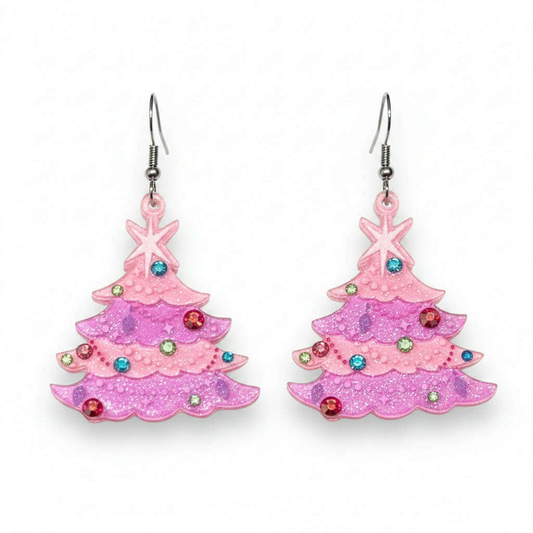 a pair of earrings with glittery trees