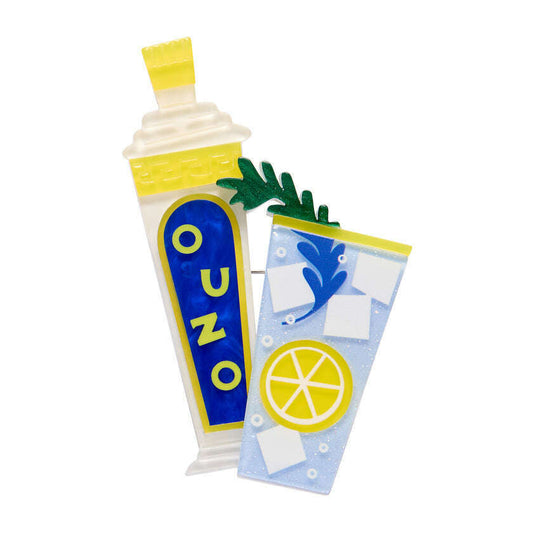 a pin with a drink and a drink in it