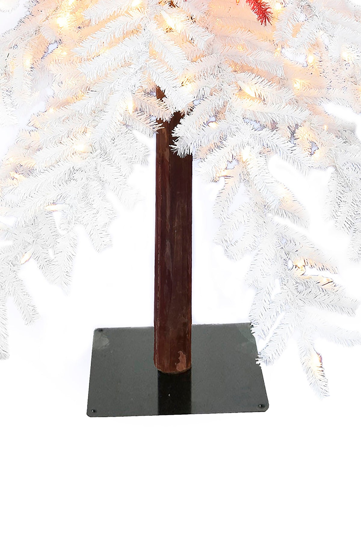 a white tree with lights