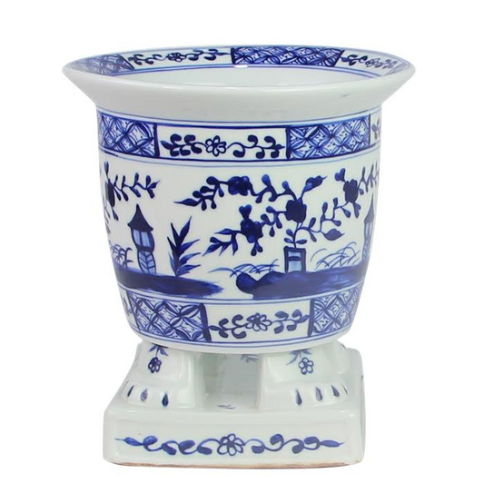 a blue and white vase
