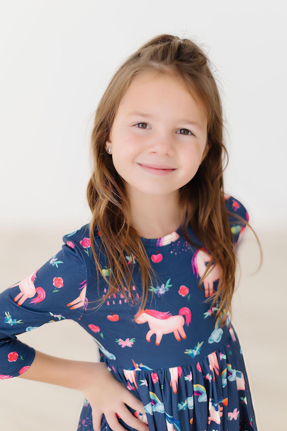 a girl smiling at the camera