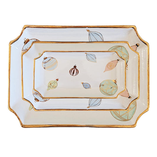 a set of plates with gold trim