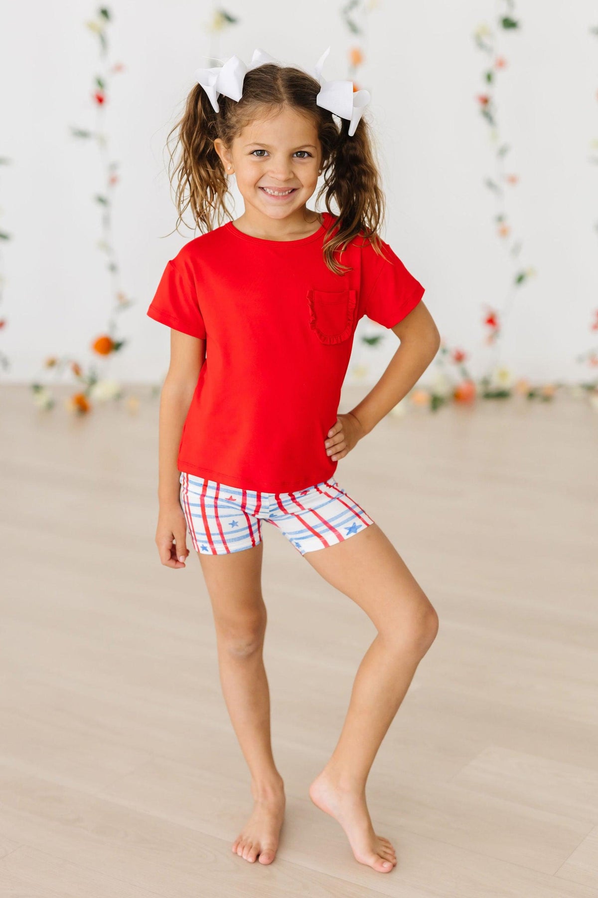 a girl in a red shirt