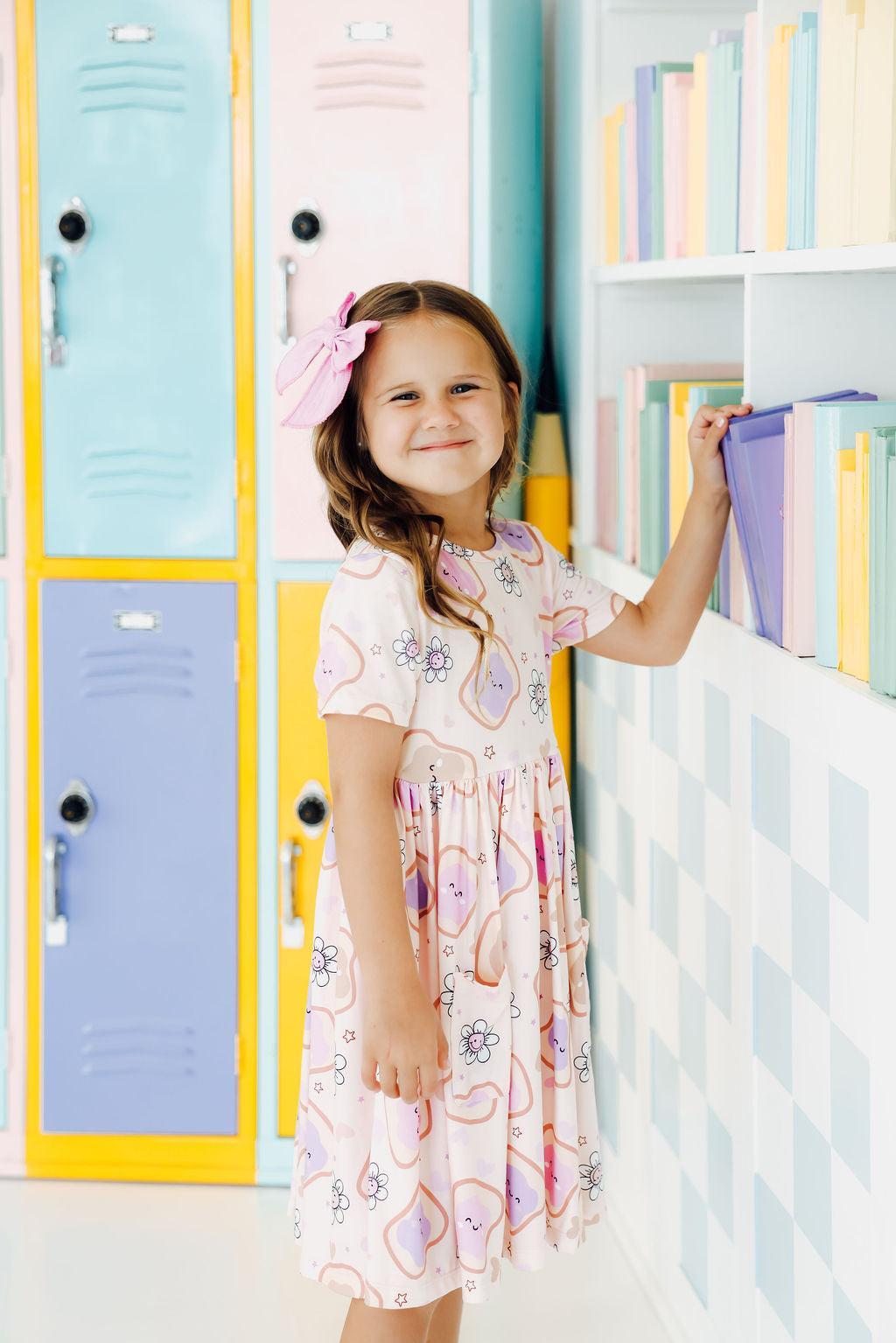 a girl smiling at the camera