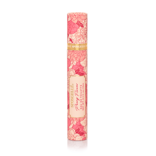 a pink and white tube with a white label
