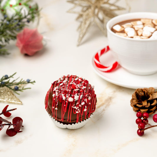 a cup of hot chocolate with marshmallows and a cup of cocoa
