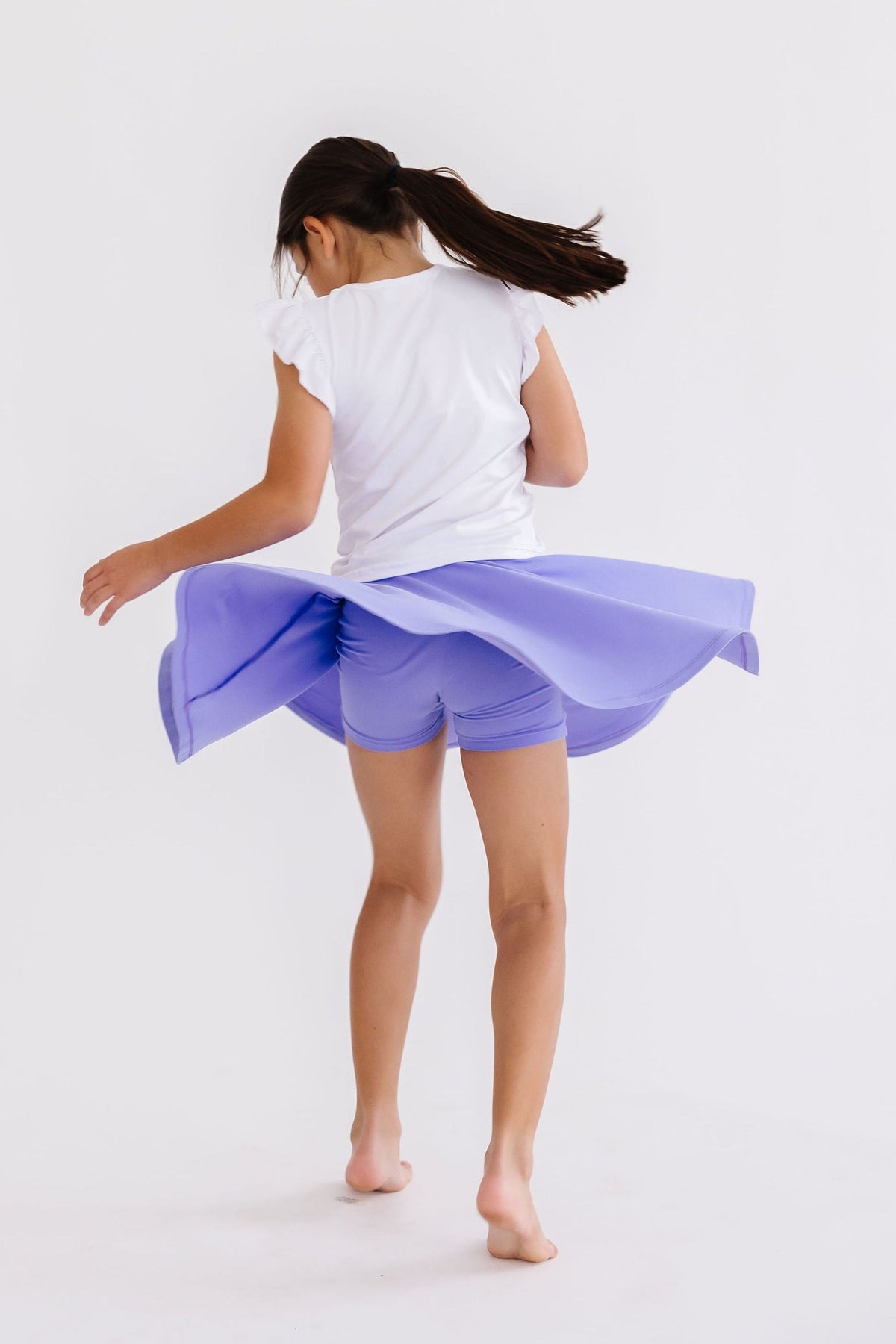 a girl in a skirt