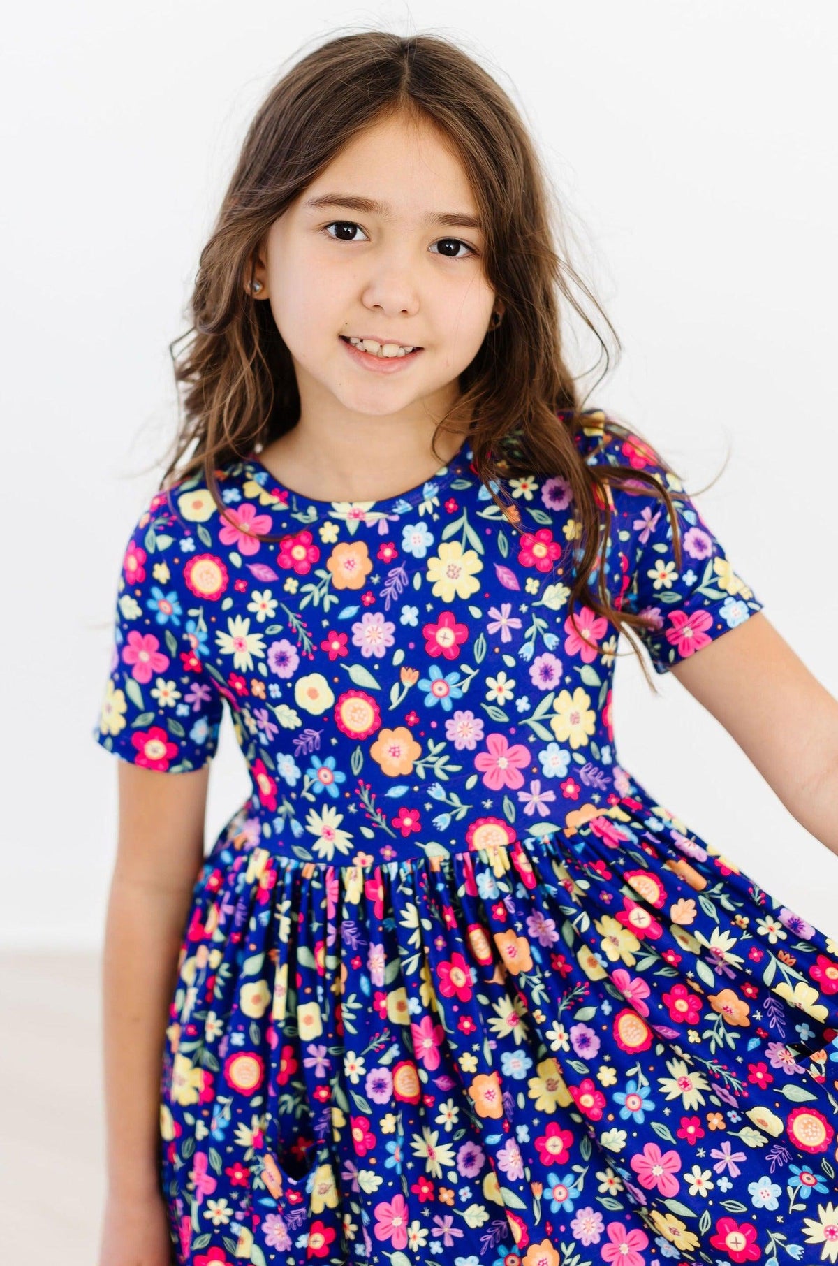a girl in a blue dress