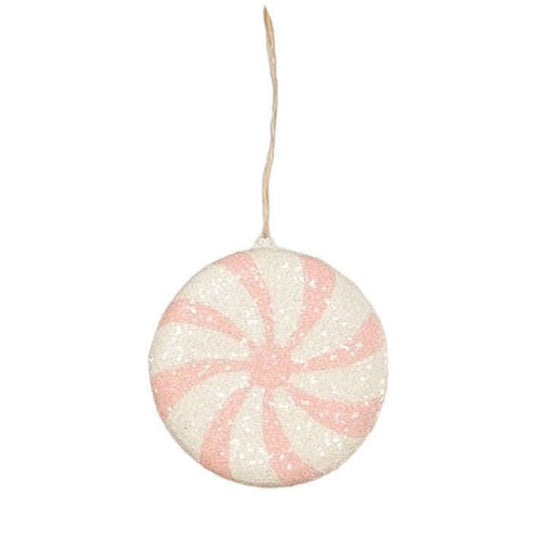 a white and pink candy ornament