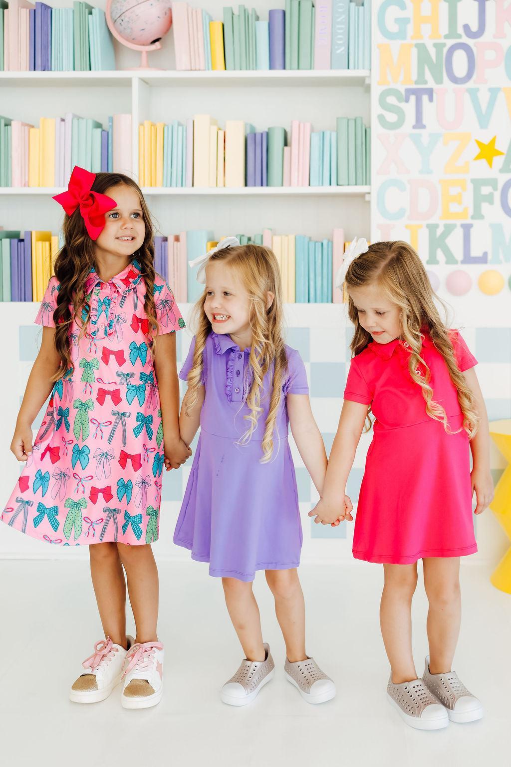 a group of girls holding hands