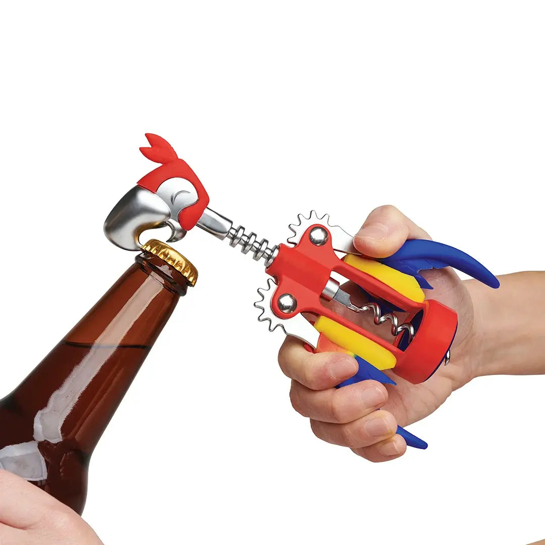 a hand holding a bottle opener