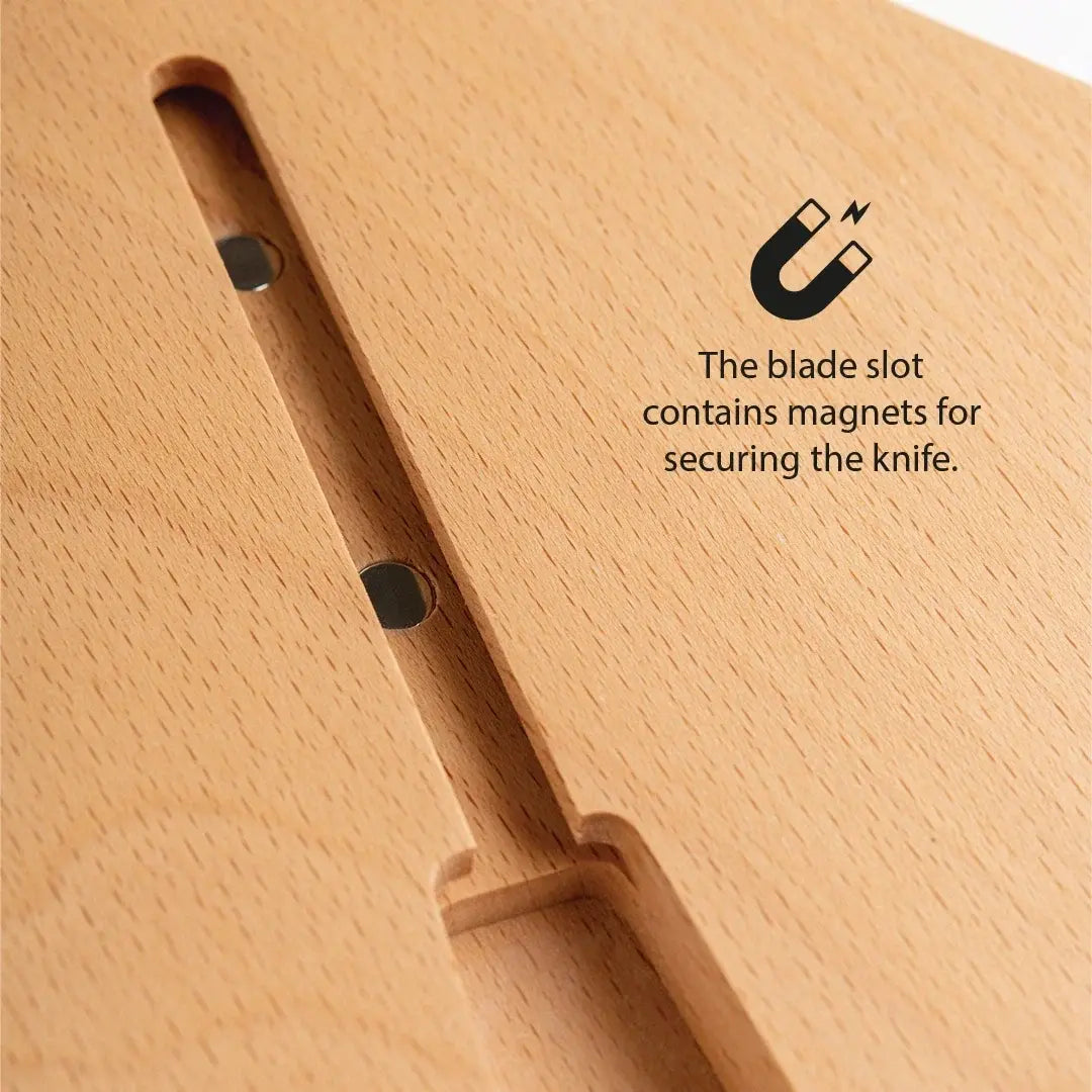 a wooden cutting board with a magnet