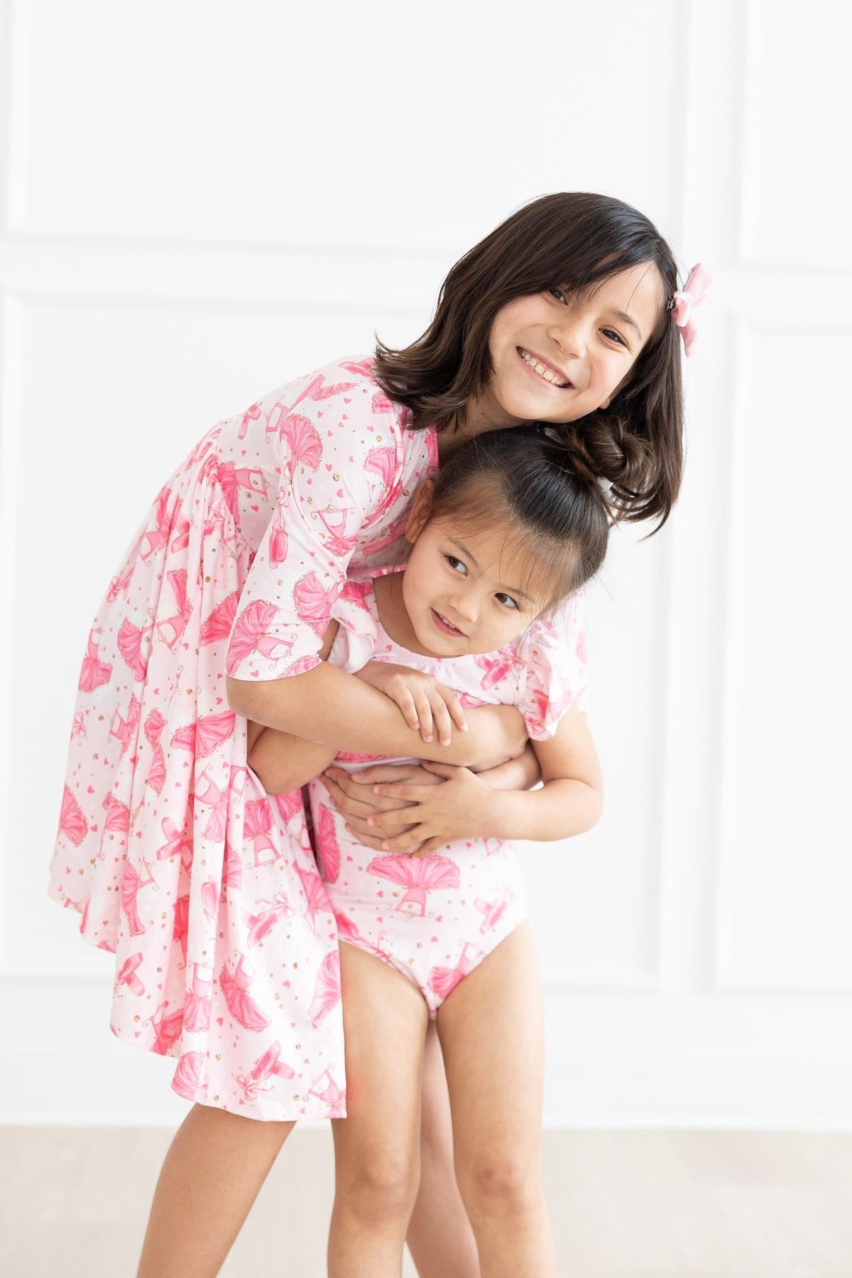two girls hugging each other
