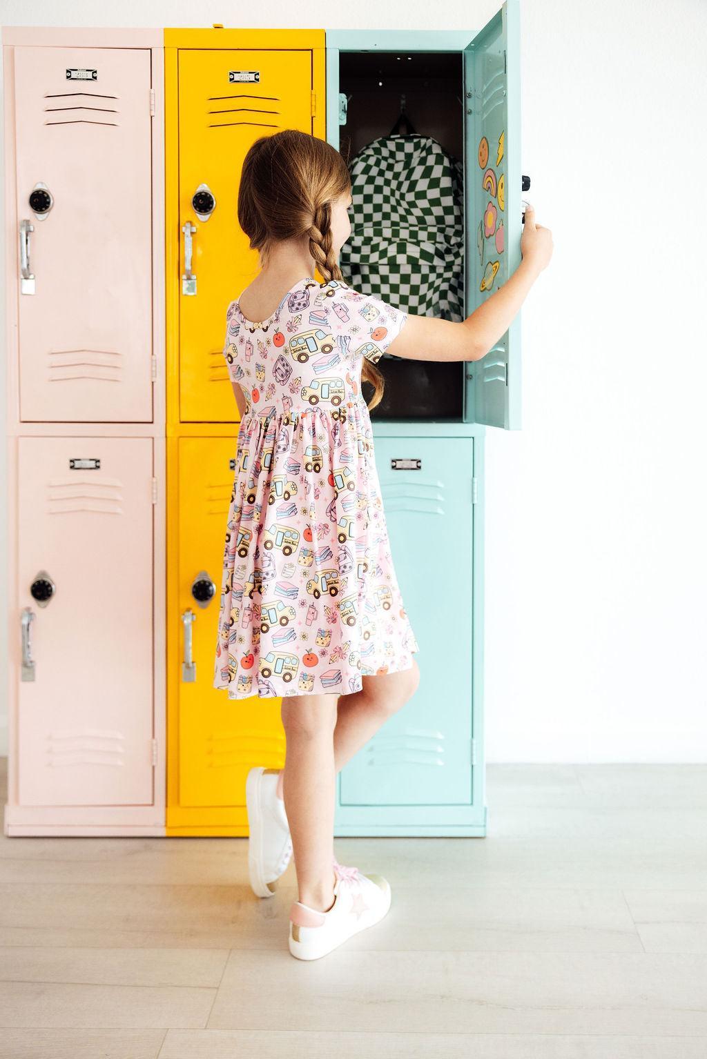 a girl opening a locker