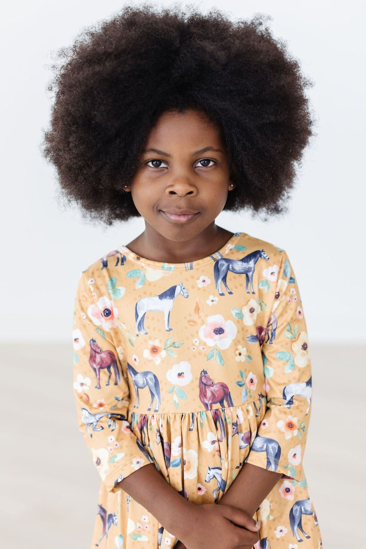 a girl with afro hair