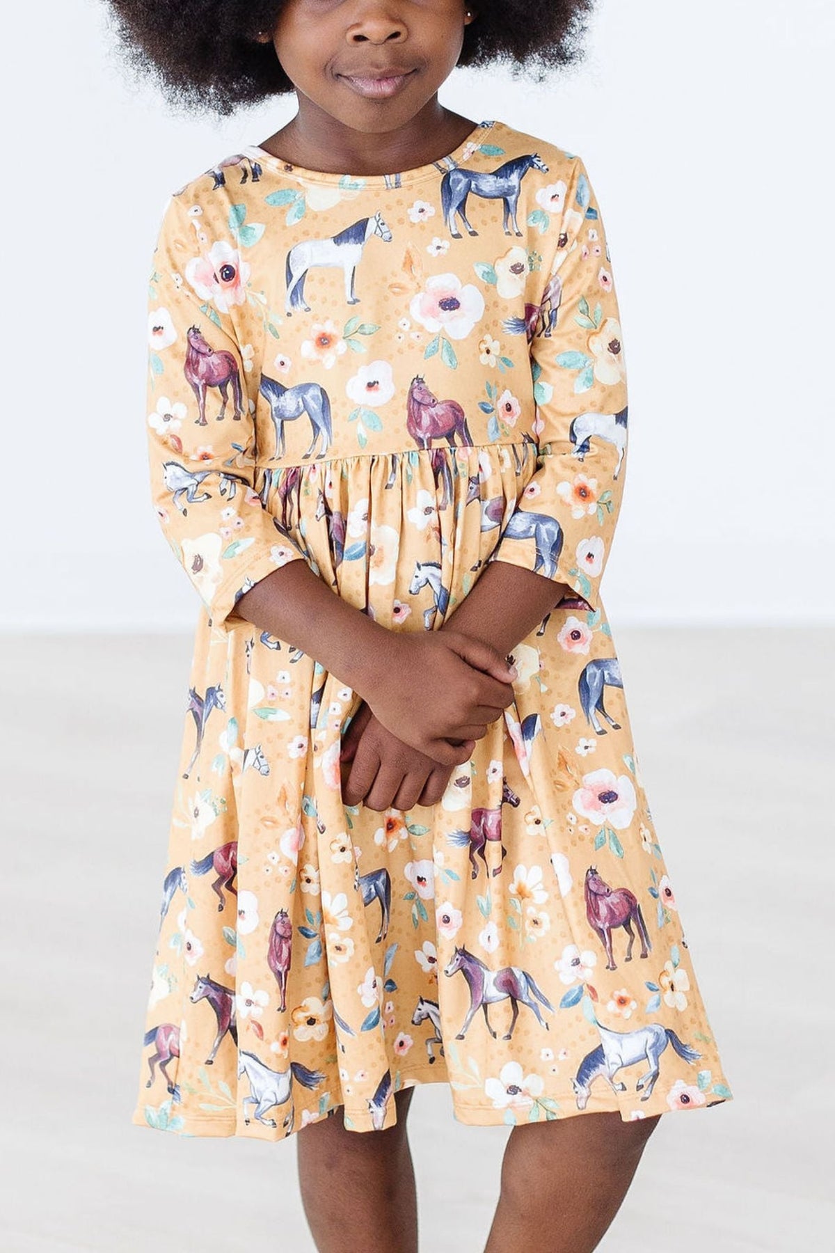 a girl in a dress