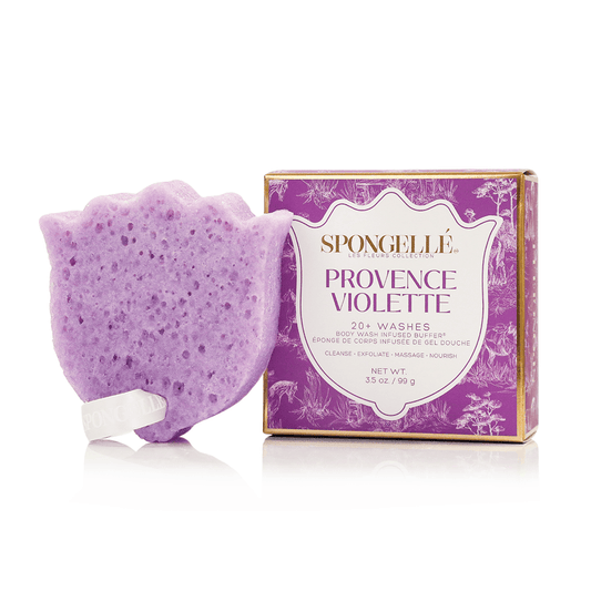a purple sponge next to a box