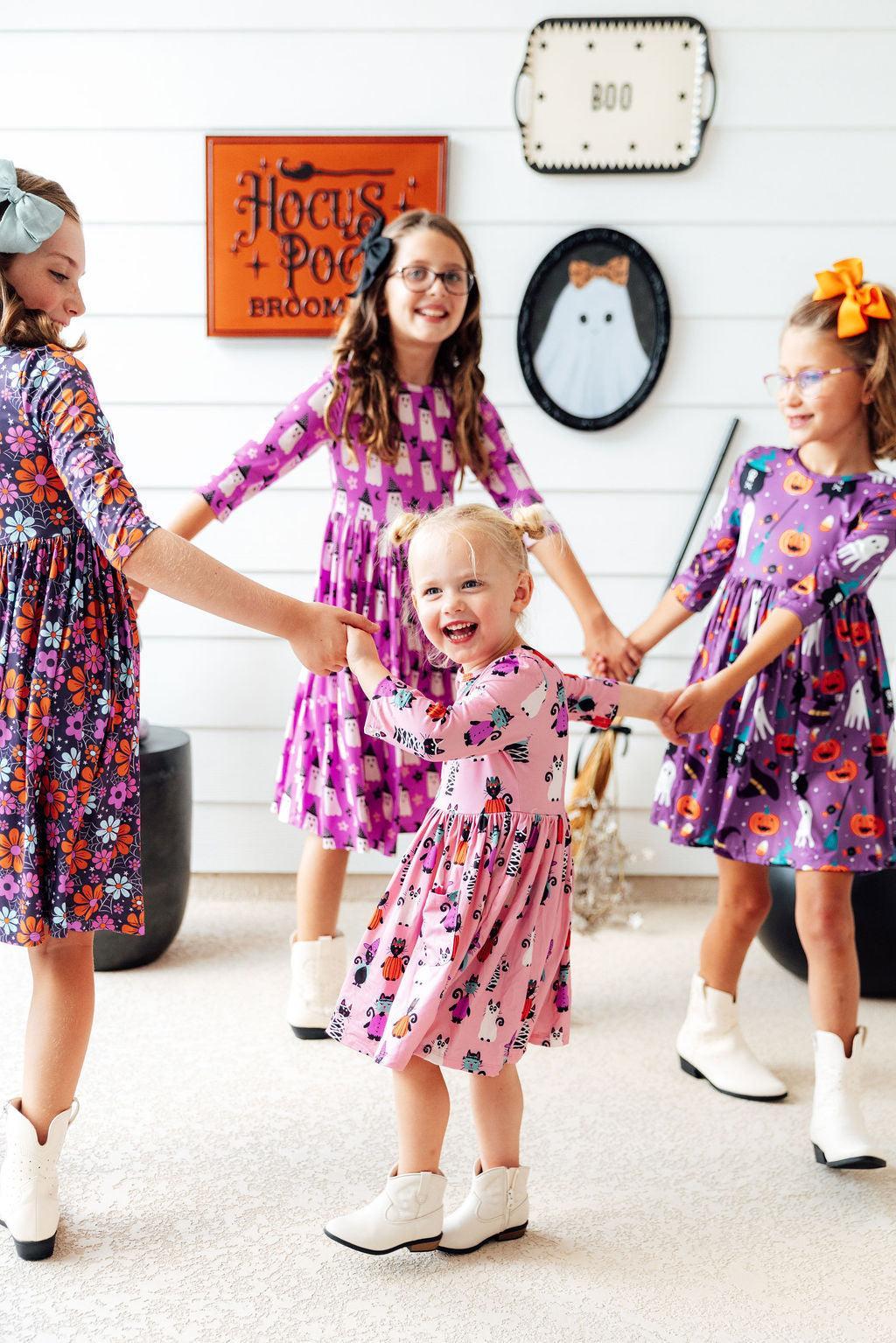 a group of girls holding hands