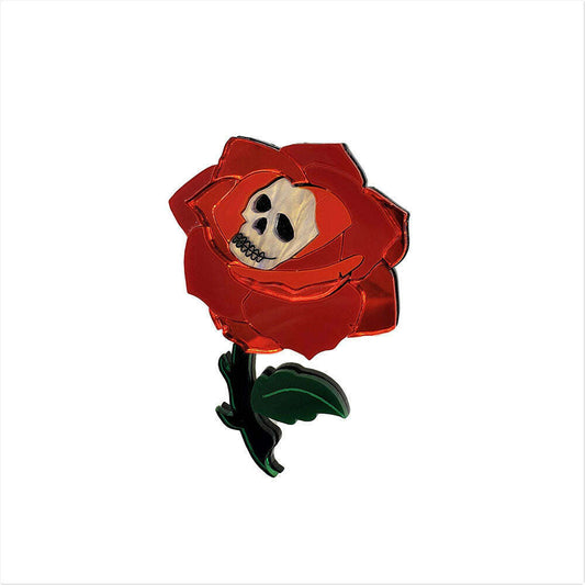 a red rose with a skull on it