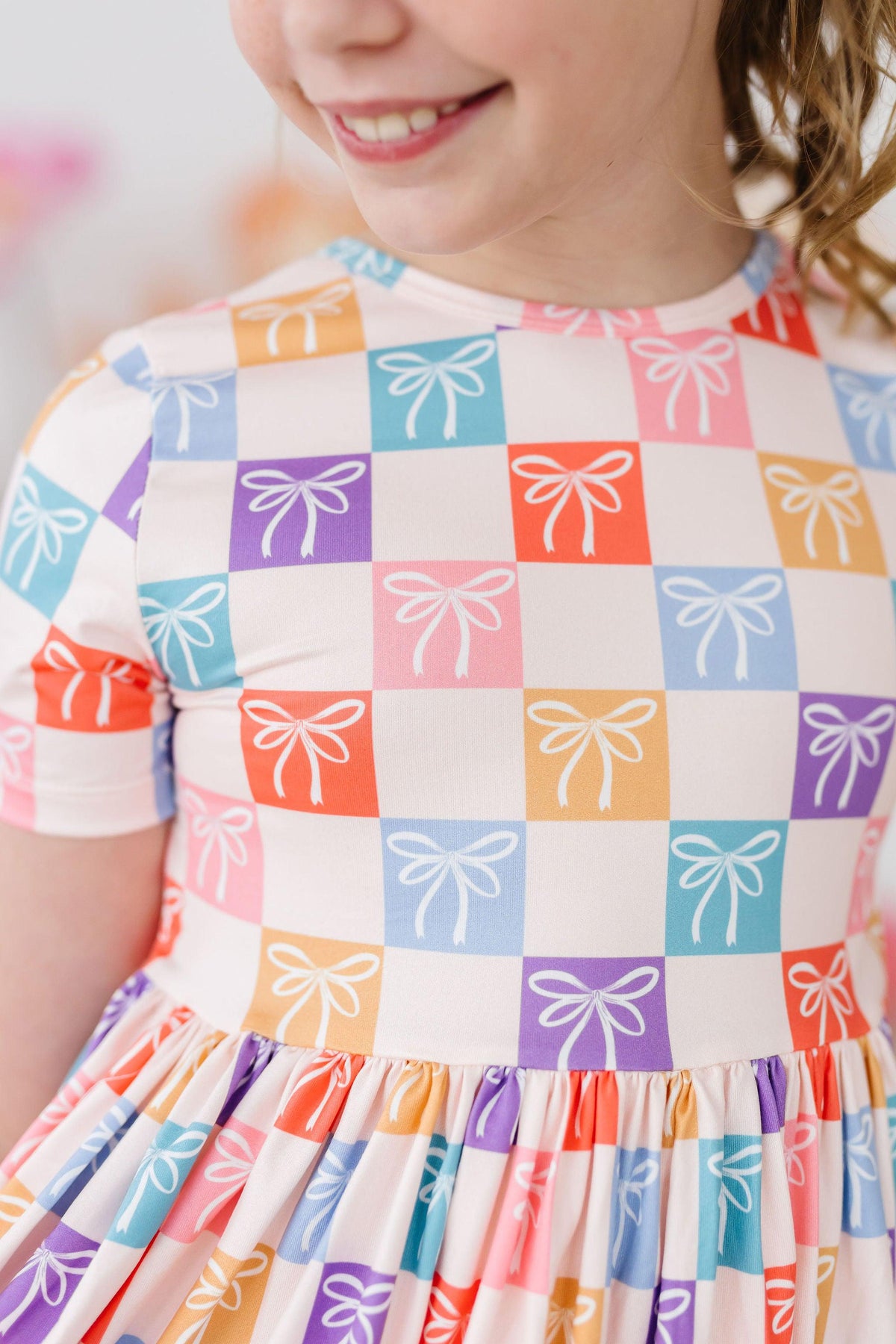a close up of a girl's dress