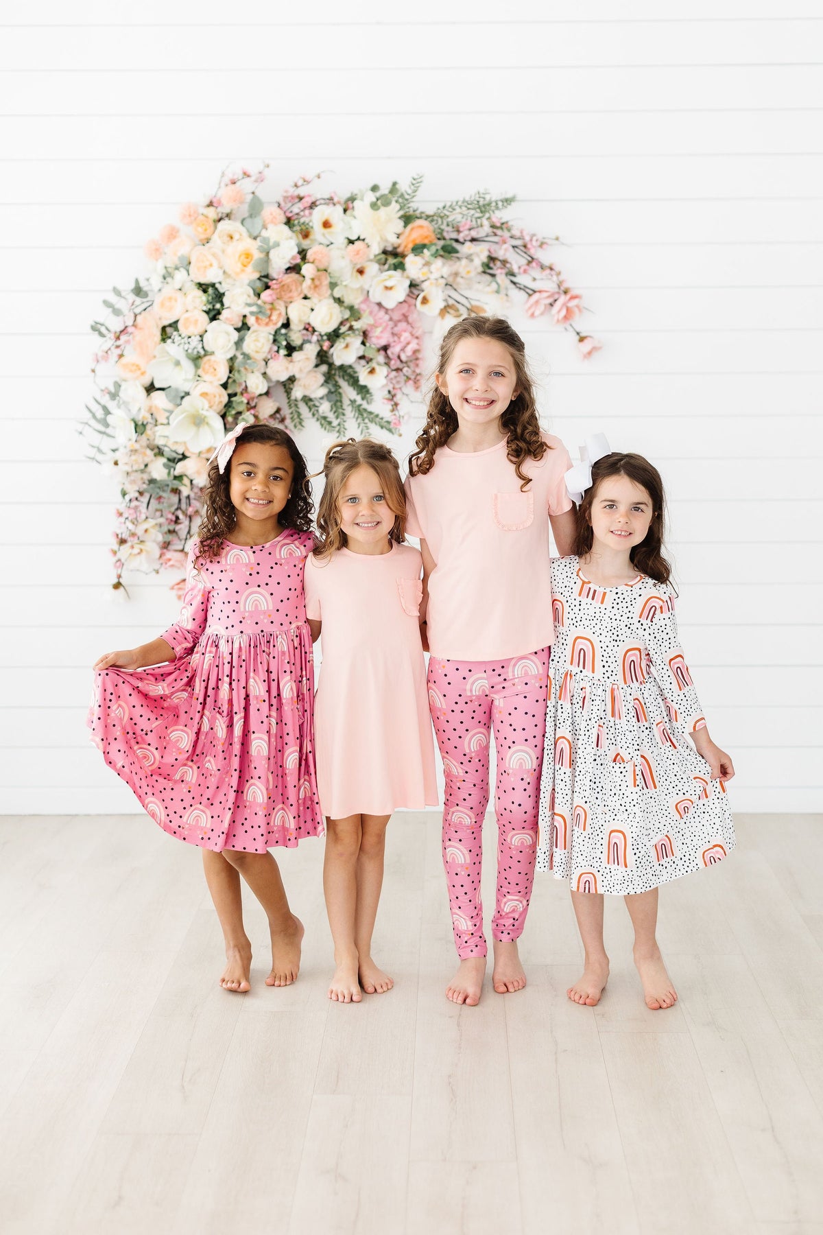 a group of girls posing for a picture
