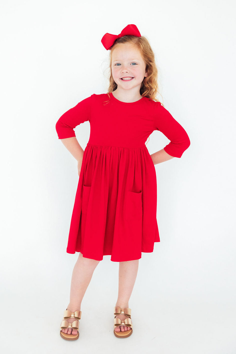 a girl in a red dress