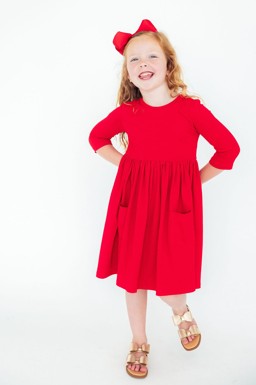 a girl in a red dress
