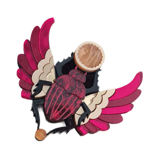 a wooden beetle with wings