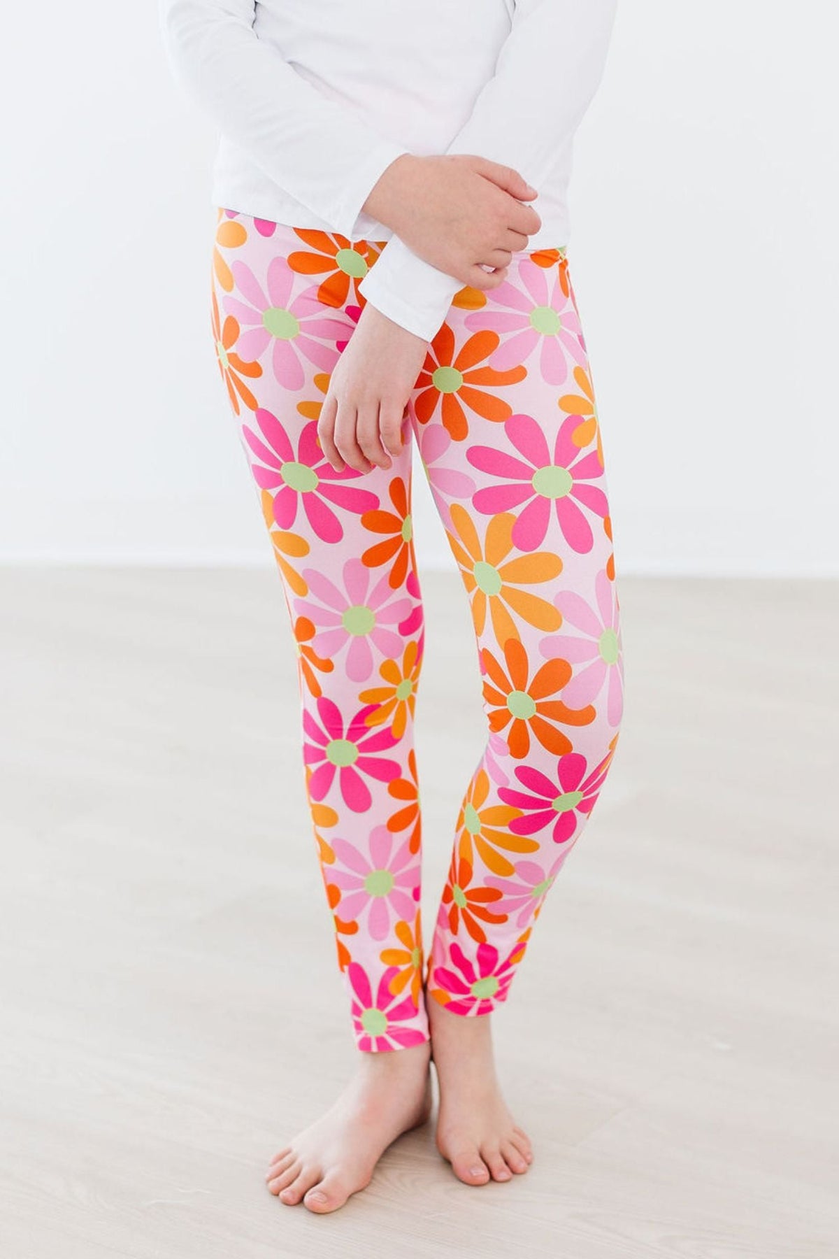 a person wearing colorful leggings