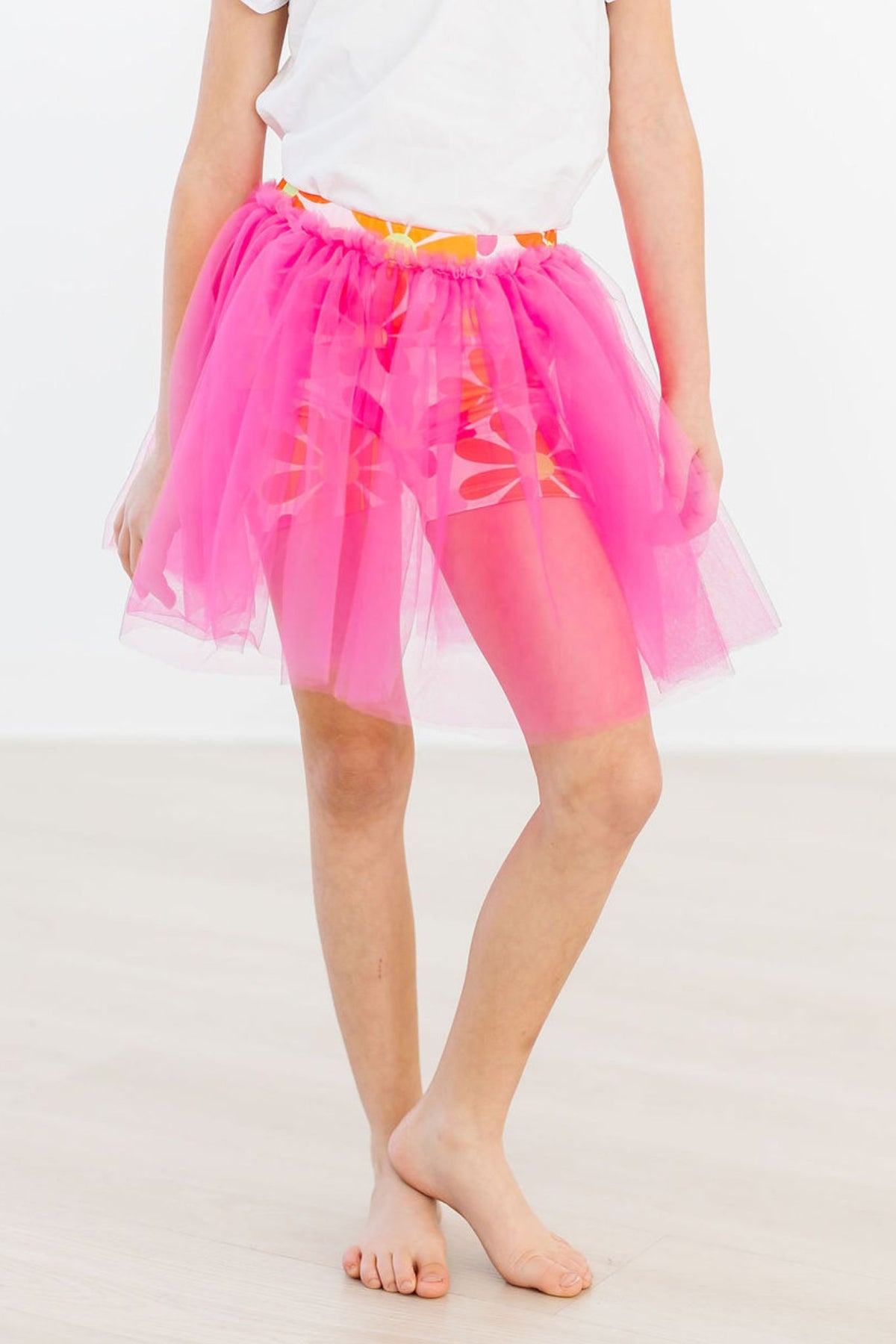 a person wearing a pink tutu
