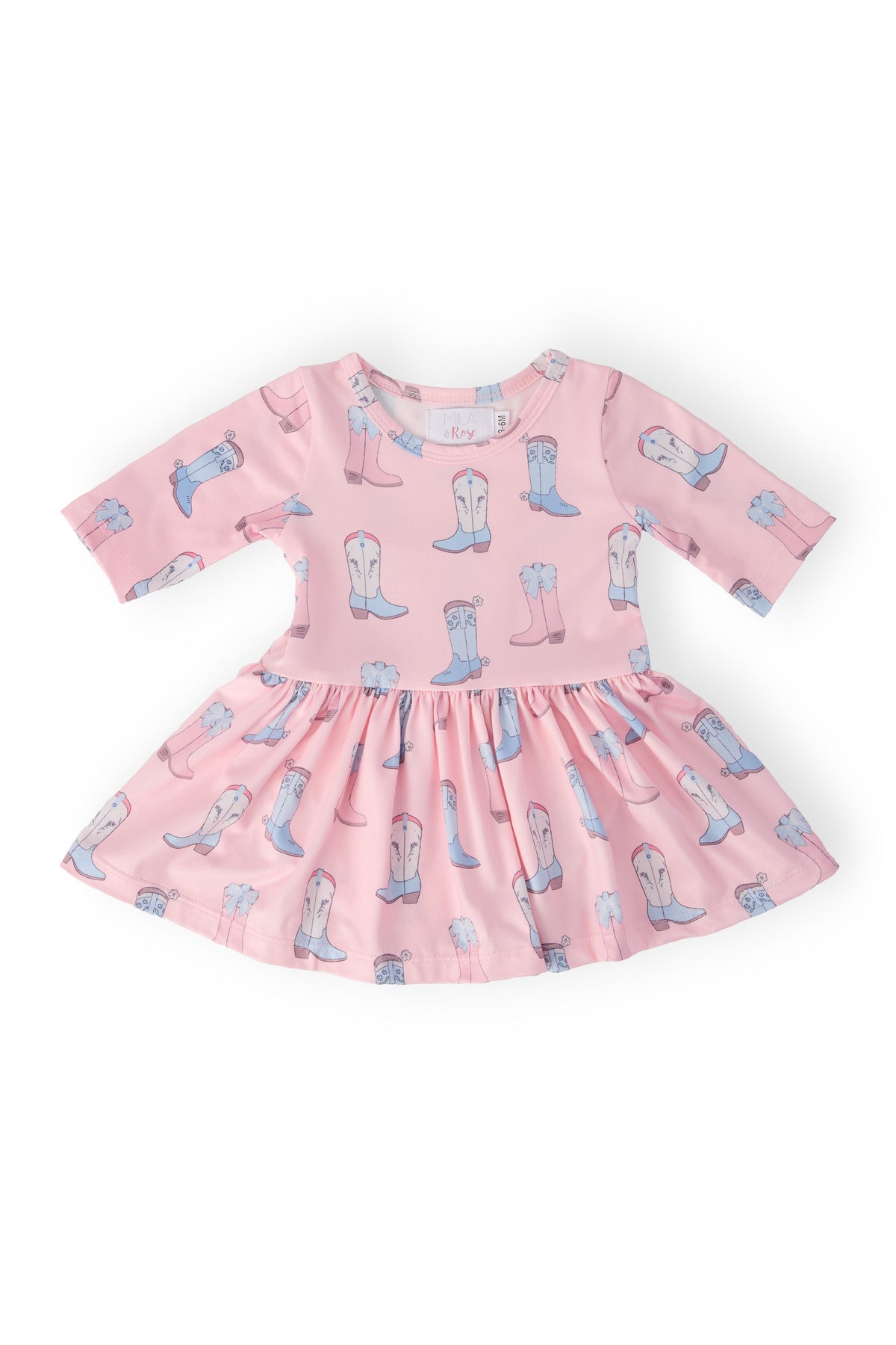 a pink dress with boots on it